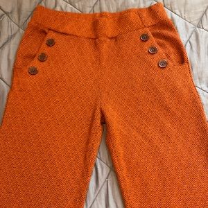Betabrand stretch orange pants with button detail